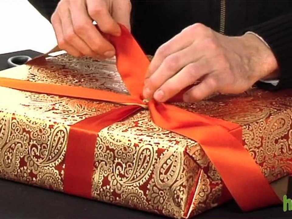 How to tie a ribbon bow onto a gift box