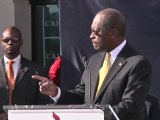 Herman Cain suspends US presidential campaign