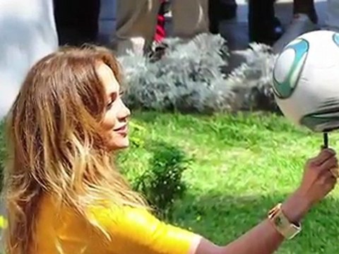 SNTV - J-Lo Stuns In Yellow While Filming New Show