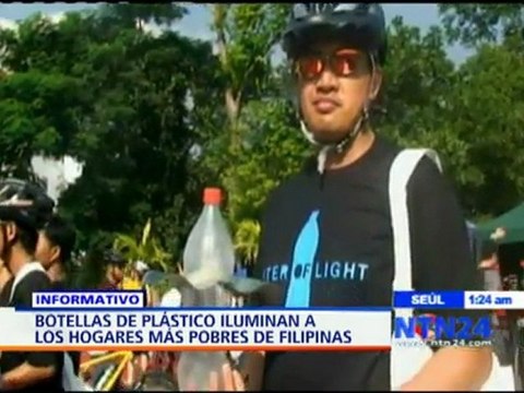 Con botellas de plástico llenas de agua cientos de filipinos iluminan sus hogares
