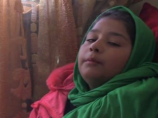 Kabul's 'girl in green' tells story of suicide blast
