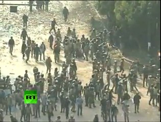 Egypte : une manifestante frappée par la police