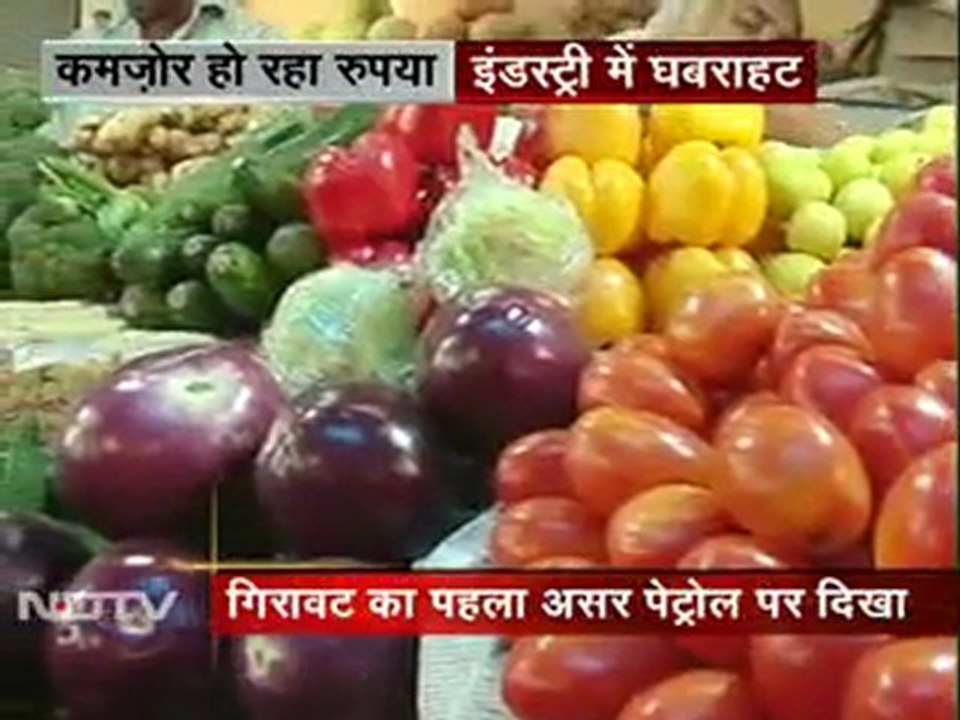 रुपया और लुढ़का, 53.74 के रिकॉर्ड स्तर पर