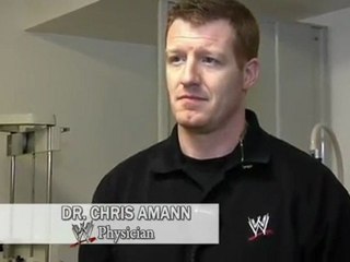 WWE.com Exclusive  WWE physician Dr. Chris Amann speaks about the condition of the cameraman