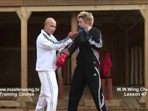 How to do Wing Chun Lesson 47-Block, cover and Chop to the neck (Pad Work)