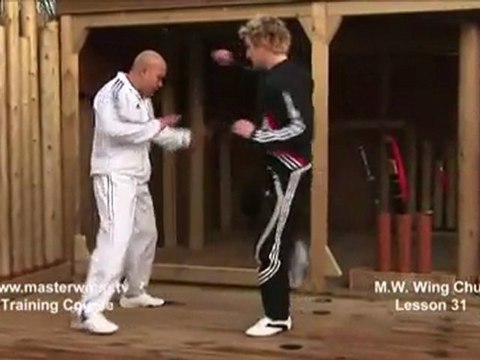 How to do Wing Chun Lesson 31- Block the round kick and elbow to the knee