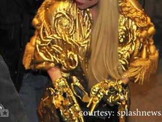 Lady Gaga covered in gold