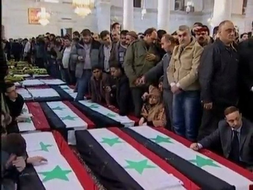Mass funeral in Syria for suicide bombing victims