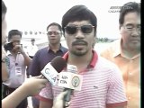 Champion boxer Pacquiao helps Philippines typhoon relief