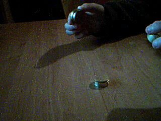 Dynamic coin tour de magie