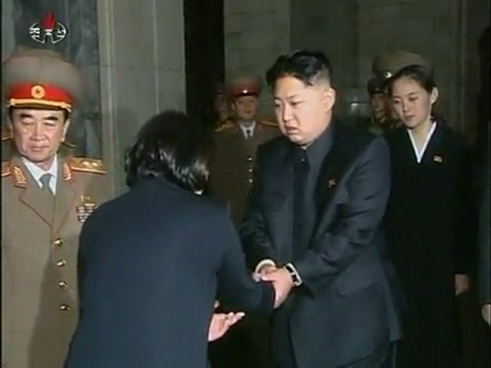 South Korean delegates mourn Kim