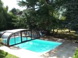 Ouverture abris piscine  médium - Woestelandt Piscines - Bourges, Vierzon, Orléans