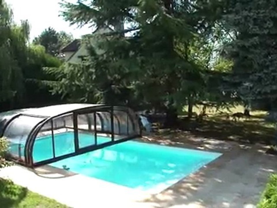 Ouverture abris piscine  médium - Woestelandt Piscines - Bourges, Vierzon, Orléans