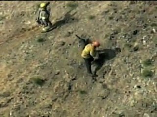 Hiker and his dog stuck on California cliff