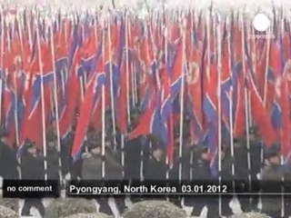 North Koreans rally in show of support for... - no comment
