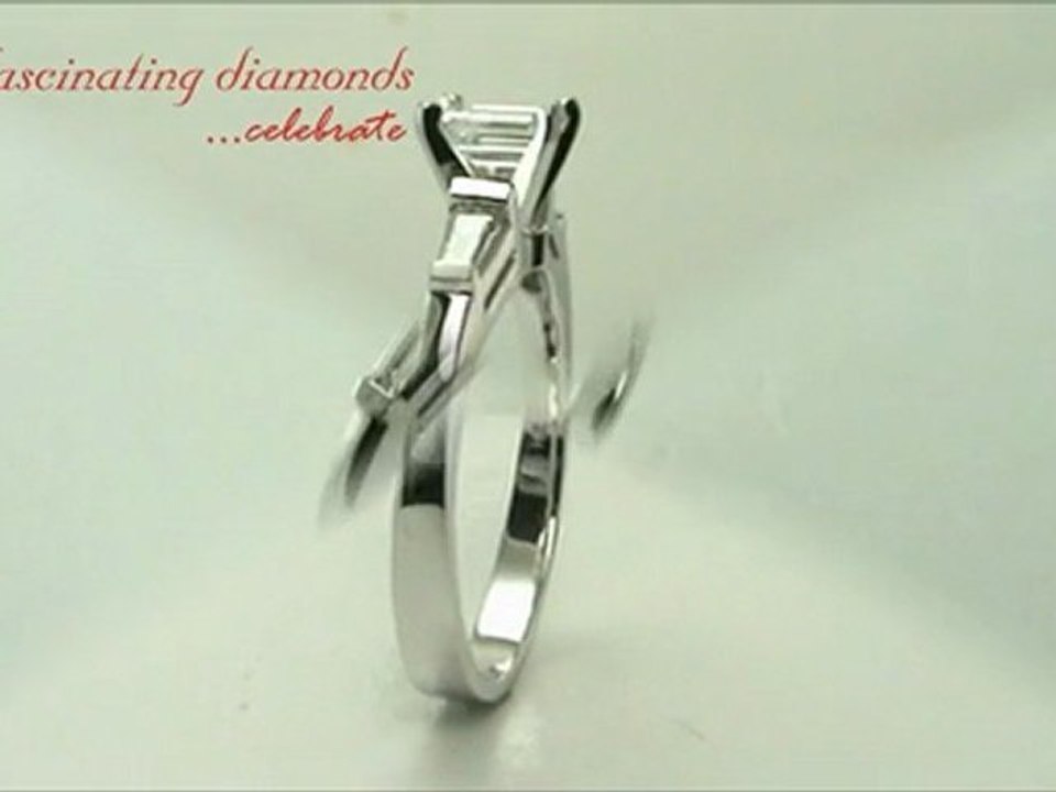 Emerald Cut Three stone Diamond Engagement Ring With Baguette Diamonds In Bar Set