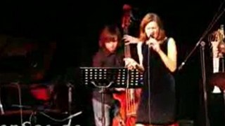 Beautiful Woman Singing Vocal Jazz Song in an Evening Dress