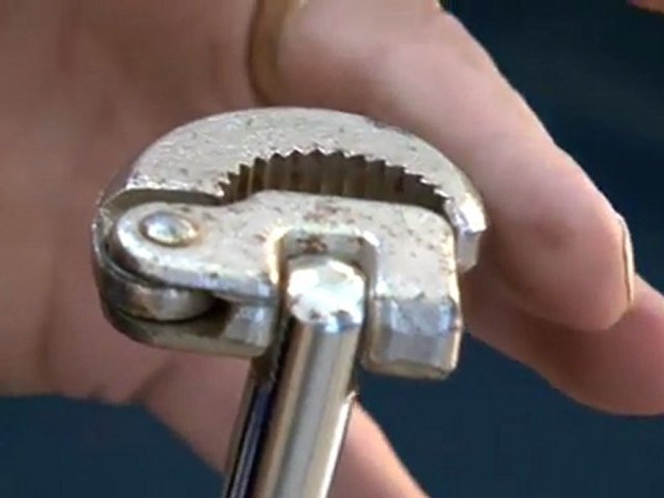 How To Use A Tap Wrench