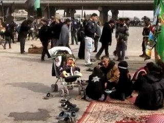 Shi'ites brave pilgrimage despite bomb threats