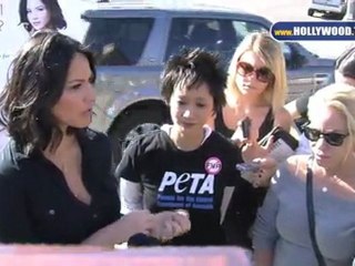 Olivia Munn takes it off for PETA