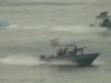 Iranian boats approach U.S. ships