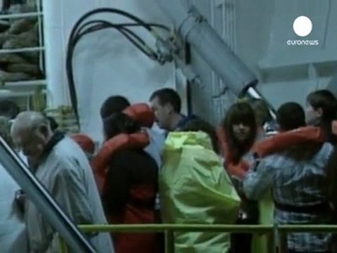 Three die as cruise ship runs aground off Italy