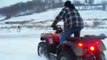 Trying to get a 1999 450 Honda Foreman stuck in packed snow with 28 inch mudlites
