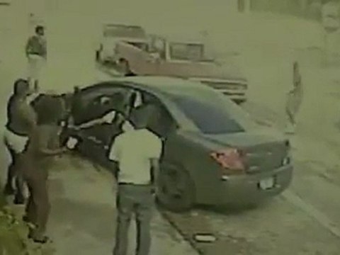 Caught On Tape: Kid Throws Brick @ Car Winshield Causing Driver To Lose Control & To Hit A Man!