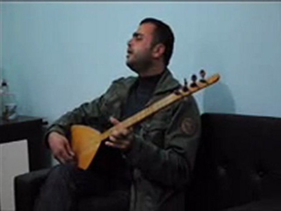 özkan korkmaz & yüce dağ başın yanar bir ışık