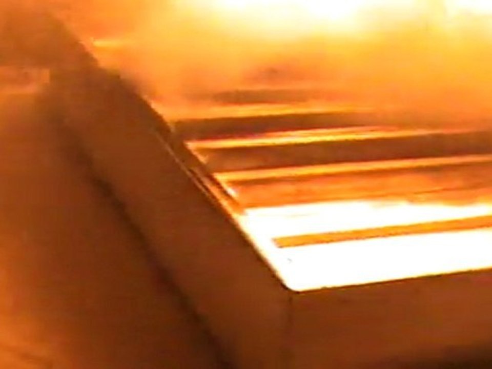 Essai feu bac avec grille d'extinction