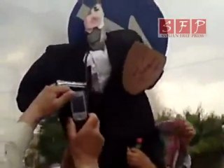 مجسم لبشار في حماة معلق به حذاء 20-5-2011