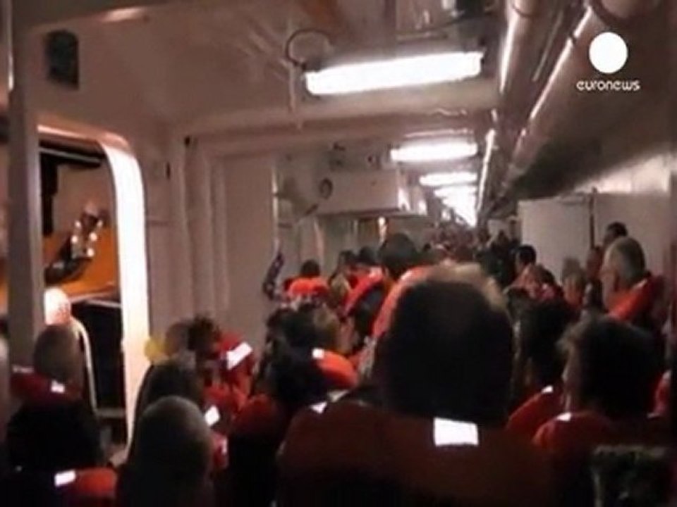 Passengers of stricken liner 'told to return to cabins'