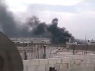 فري برس   باباعمرو دخان كثيف جدا 14 11 2011