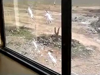 فري برس   حمص القصير حاجز لقوات الإحتلال وآثار استهدافه للبيوت القريبة 12 12 2011