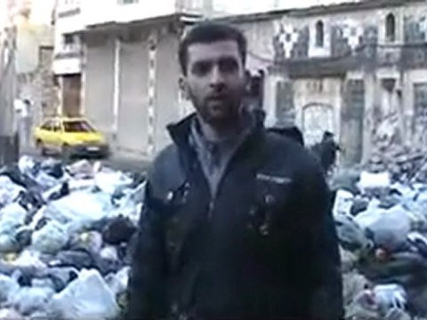 فري برس حمص طريق السوق ممتلئ بلقمامة 18 1 2012