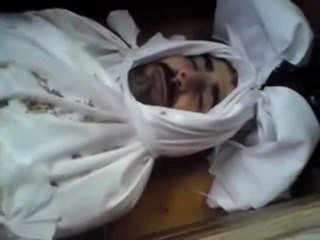 فري برس   حمص الوعر جثمان جمال عبدالله فاضل 24 10 2011