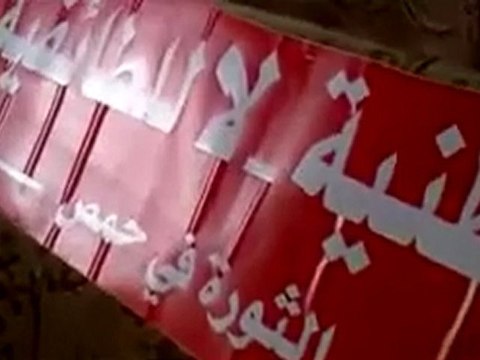 فري برس حمص باب السباع شباب الثورة يجهزون الافتات 25 11 2011