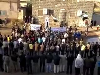 فري برس   انخل رغم الحصار و الثوار يصنعون مجسم لساعه حمص 3 1 2012