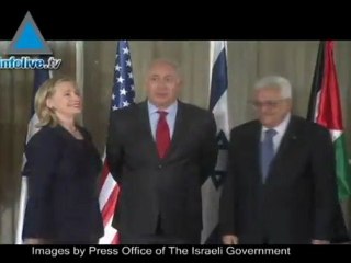 Mortars fly as Clinton visits