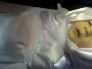 فري برس   الشهيد علاء ابو اللبن وطفله مجد والشهيد حسين غزالة