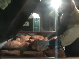 Loading the Smoker at the South Carolina BBQ Association