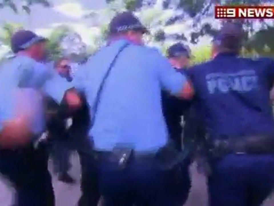 Australia PM rescued from protest