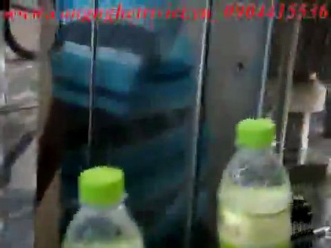 Dây chuyền 3 in 1 ( Xúc rửa - Chiết rót - Đóng ,xiết nắp )