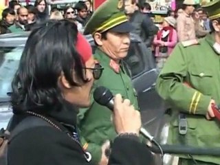 Tibetans depict tensions in street play