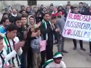 فري برس   حماة كفرزيتا حرق العلم الروسي وصور الخائن بشار 29 1 2012