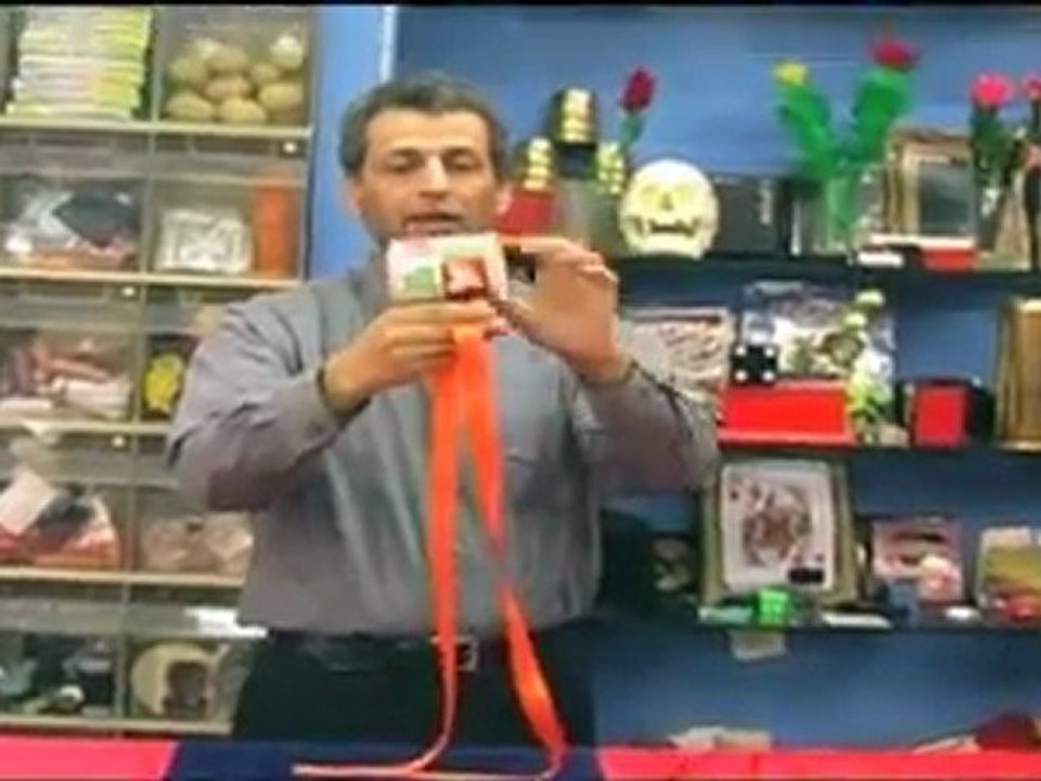Learn magic trick- Ribbon Melt Through Mug