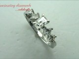 Emerald Cut Diamond Engagement Ring With Princess Diamonds In Prong Set