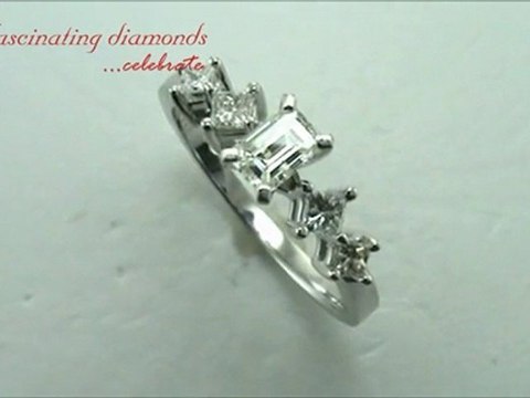 Emerald Cut Diamond Engagement Ring With Princess Diamonds In Prong Set