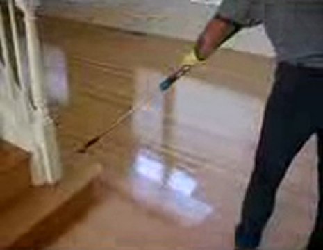 hardwood floors applying final coat/Handyman