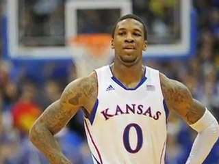 UConn's Woes Continue; Robinson Shines